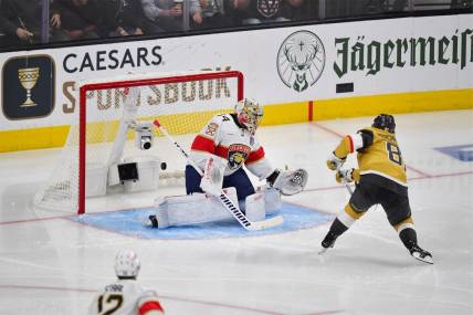 Jun 5, 2023; Las Vegas, Nevada, USA; Vegas Golden Knights right wing Jonathan Marchessault (81) scores gaol on Florida Panthers goaltender Alex Lyon (34) in the third period in game two of the 2023 Stanley Cup Final at T-Mobile Arena. Mandatory Credit: Gary A. Vasquez-USA TODAY Sports