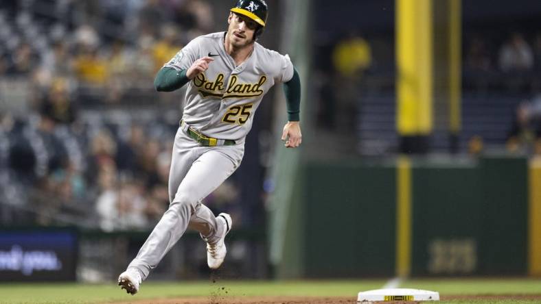 Jun 5, 2023; Pittsburgh, Pennsylvania, USA;  Oakland Athletics designated hitter Brent Rooker (25) runs toward home plate to score during the eighth inning against the Pittsburgh Pirates at PNC Park. Mandatory Credit: Scott Galvin-USA TODAY Sports