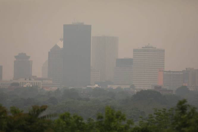 Smog from the wildfires in Canada have been making their way across the upper United States.  The smog obscures some of the Rochester skyline that is normally clearly scene at Cobb Hills Park.