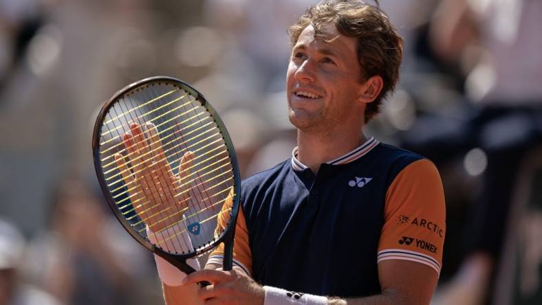 Jun 5 2023; Paris, France; Casper Ruud (NOR) celebrates after defeating Nicolas Jarry (CHI) on day nine at Stade Roland-Garros. Mandatory Credit: Susan Mullane-USA TODAY Sports