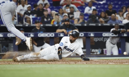 Jun 6, 2023; Miami, Florida, USA; Miami Marlins second baseman Luis Arraez (3) scores on a wild pitch against the Kansas City Royals during the seventh inning at loanDepot Park. Mandatory Credit: Rhona Wise-USA TODAY Sports