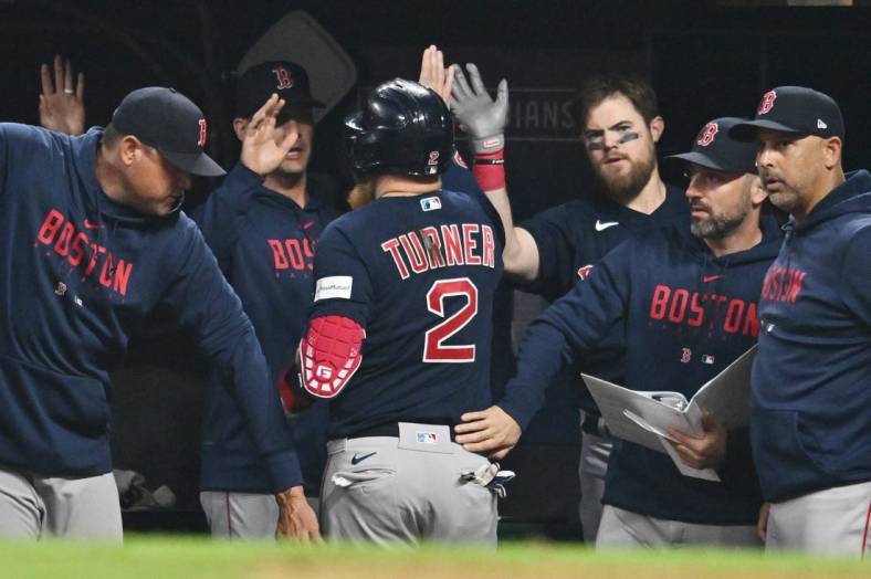 Red Sox let lead slip, rally to defeat Guardians in extras