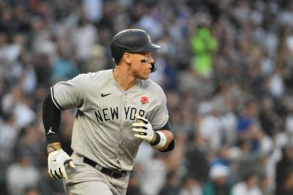 May 29, 2023; Seattle, Washington, USA; New York Yankees right fielder Aaron Judge (99) runs towards first base after hitting the ball against the Seattle Mariners at T-Mobile Park. Mandatory Credit: Steven Bisig-USA TODAY Sports