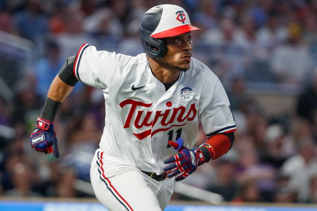 Jun 2, 2023; Minneapolis, Minnesota, USA; Minnesota Twins second baseman Jorge Polanco (11) hits an RBI double against the Cleveland Guardians in the seventh inning at Target Field. Mandatory Credit: Bruce Kluckhohn-USA TODAY Sports