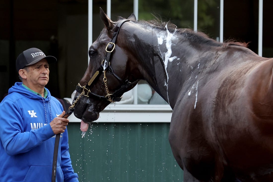 Jun 7, 2023; Elmont, New York, USA; Belmont Stakes contender Forte is bathed after a morning workout at Belmont Park. Mandatory Credit: Brad Penner-USA TODAY Sports