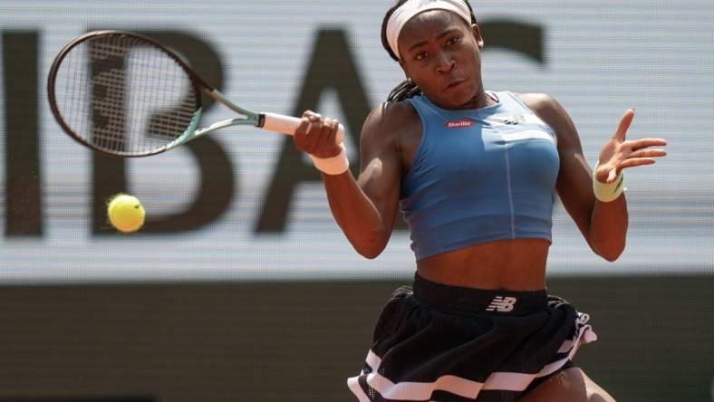 Jun 7 2023; Paris,France; Coco Gauff (USA) returns a shot during her match against Iga Swiatek (POL) on day 11 at Stade Roland-Garros. Mandatory Credit: Susan Mullane-USA TODAY Sports