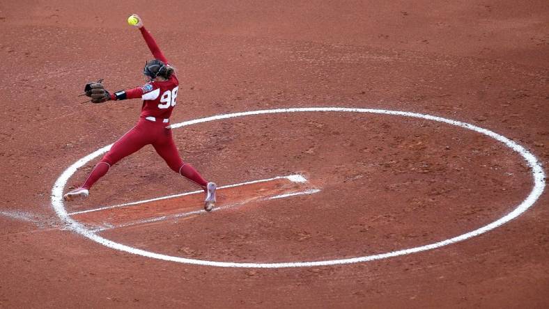 Oklahoma's Jordy Bahl (98) throws a pitch in the first inning during a softball game between the Oklahoma Sooners and Florida State in the Women's College World Championship Series at USA Softball Hall of Fame Stadium in  in Oklahoma City, Wednesday, June, 7, 2023.