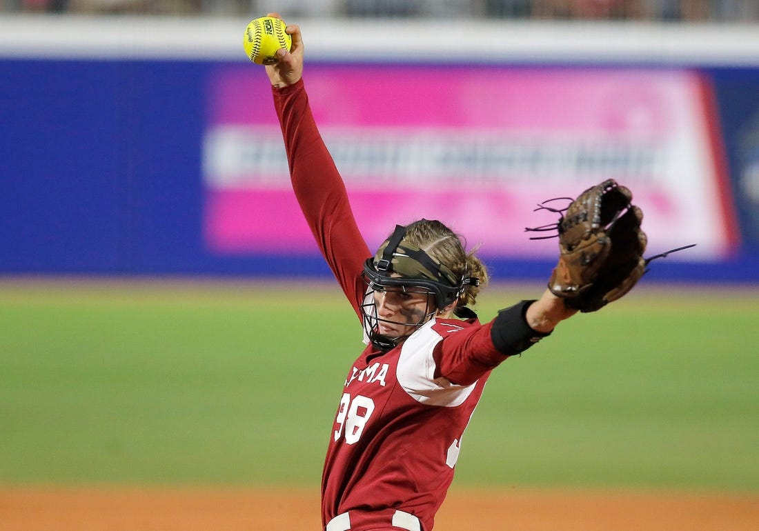 Oklahoma's Jordy Bahl (98) throws a pitch in the second inning during the first game of the Women's College World Championship Series between the Oklahoma Sooners and Florida State at USA Softball Hall of Fame Stadium in  in Oklahoma City, Wednesday, June, 7, 2023.