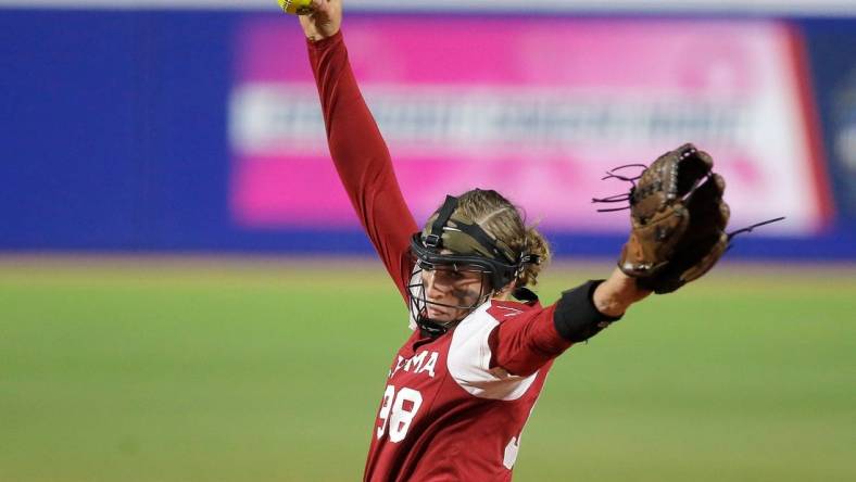 Oklahoma's Jordy Bahl (98) throws a pitch in the second inning during the first game of the Women's College World Championship Series between the Oklahoma Sooners and Florida State at USA Softball Hall of Fame Stadium in  in Oklahoma City, Wednesday, June, 7, 2023.