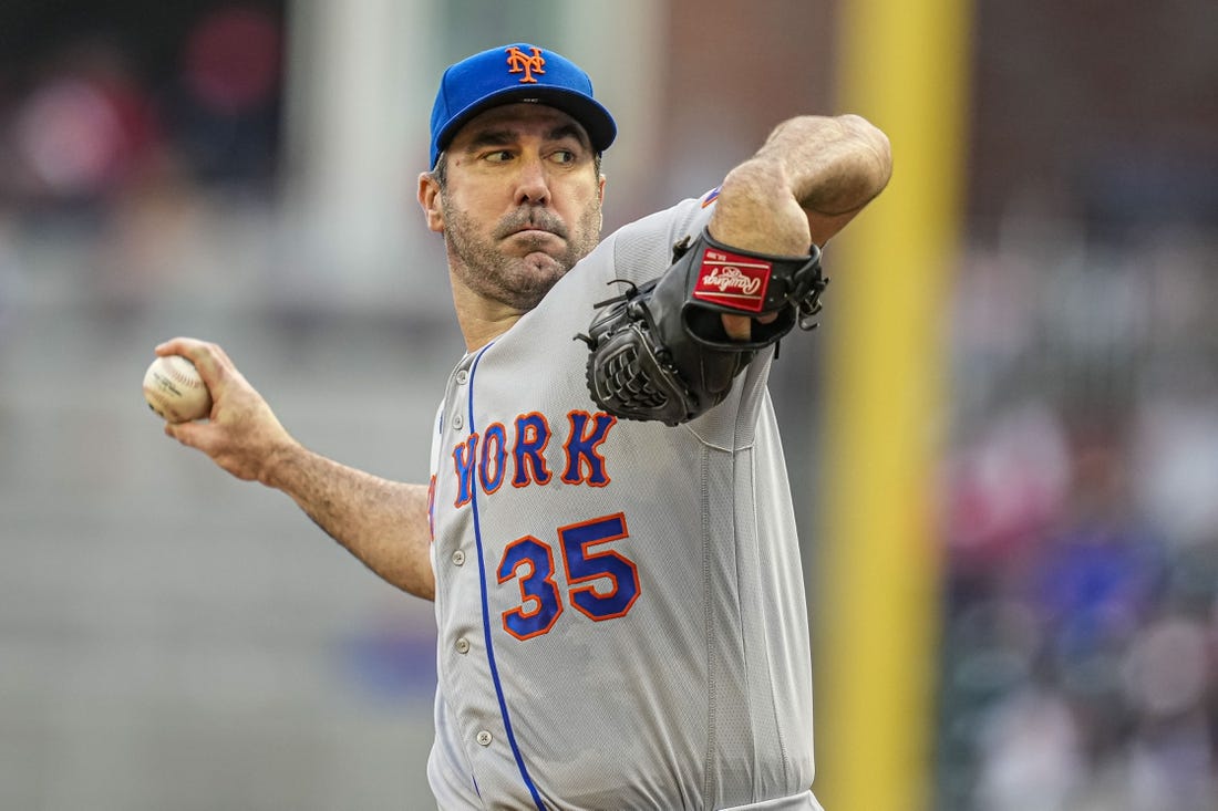 Jun 8, 2023; Cumberland, Georgia, USA; New York Mets starting pitcher Justin Verlander (35)  pitches against the Atlanta Braves during the first inning at Truist Park. Mandatory Credit: Dale Zanine-USA TODAY Sports