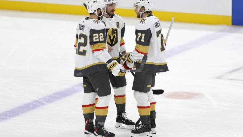 Jun 8, 2023; Sunrise, Florida, USA; Vegas Golden Knights right wing Michael Amadio (22), right wing Reilly Smith (19), and center William Karlsson (71) speak during a timeout during the third period against the Florida Panthers in game three of the 2023 Stanley Cup Final at FLA Live Arena. Mandatory Credit: Sam Navarro-USA TODAY Sports