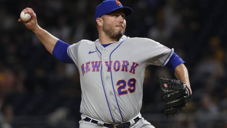 Jun 9, 2023; Pittsburgh, Pennsylvania, USA;  New York Mets relief pitcher Tommy Hunter (29) pitches against the Pittsburgh Pirates during the seventh inning at PNC Park. Mandatory Credit: Charles LeClaire-USA TODAY Sports