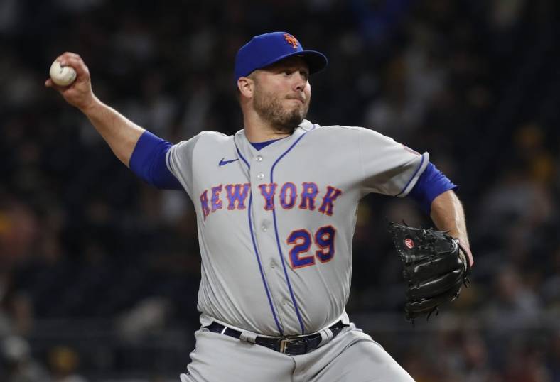Jun 9, 2023; Pittsburgh, Pennsylvania, USA;  New York Mets relief pitcher Tommy Hunter (29) pitches against the Pittsburgh Pirates during the seventh inning at PNC Park. Mandatory Credit: Charles LeClaire-USA TODAY Sports