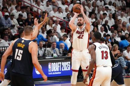 Jun 9, 2023; Miami, Florida, USA; Miami Heat forward Kevin Love (42) shoots the ball against the Denver Nuggets during the third quarter in game four of the 2023 NBA Finals at Kaseya Center. Mandatory Credit: Kyle Terada-USA TODAY Sports