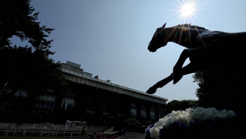 Jun 10, 2023; Elmont, New York, USA; A statue of Secretariat in the paddock area at Belmont Park. This year marks the 50th anniversary of the horse's triple crown. Mandatory Credit: Brad Penner-USA TODAY Sports