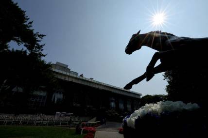 Jun 10, 2023; Elmont, New York, USA; A statue of Secretariat in the paddock area at Belmont Park. This year marks the 50th anniversary of the horse's triple crown. Mandatory Credit: Brad Penner-USA TODAY Sports