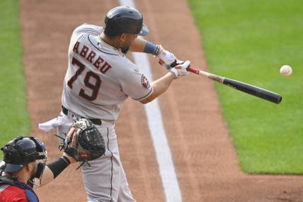 Jun 10, 2023; Cleveland, Ohio, USA; Houston Astros first baseman Jose Abreu (79) hits a two-run home run in the first inning against the Cleveland Guardians at Progressive Field. Mandatory Credit: David Richard-USA TODAY Sports