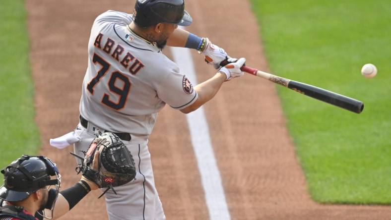 Jun 10, 2023; Cleveland, Ohio, USA; Houston Astros first baseman Jose Abreu (79) hits a two-run home run in the first inning against the Cleveland Guardians at Progressive Field. Mandatory Credit: David Richard-USA TODAY Sports