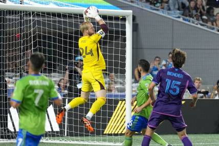 Jun 10, 2023; Charlotte, North Carolina, USA; Seattle Sounders goalkeeper Stefan Frei (24) leaps for the save during the second half against the Charlotte FC at Bank of America Stadium. Mandatory Credit: Jim Dedmon-USA TODAY Sports