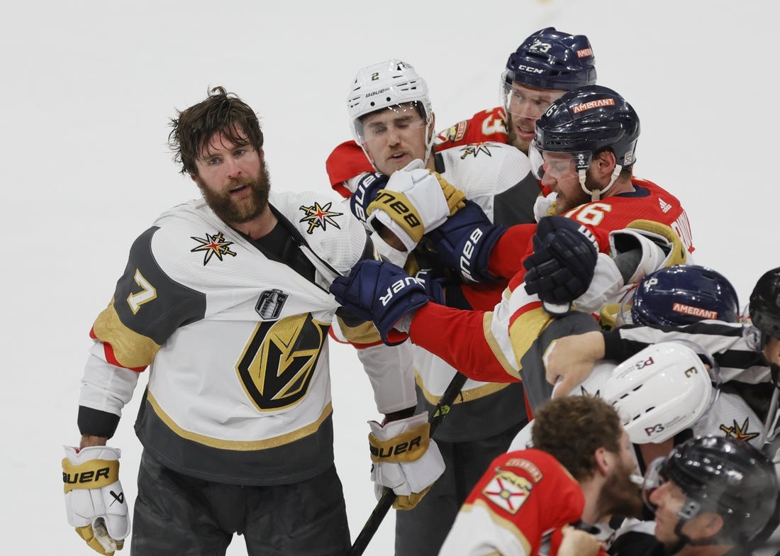 June 10, 2023; Sunrise, FL, USA; Vegas Golden Knights defenseman Alex Pietrangelo (7) and defenseman Zach Whitecloud (2) are held by Florida Panthers center Aleksander Barkov (16) and center Carter Verhaeghe (23) after game four of the 2023 Stanley Cup Final at FLA Live Arena. Mandatory Credit: Sam Navarro-USA TODAY Sports