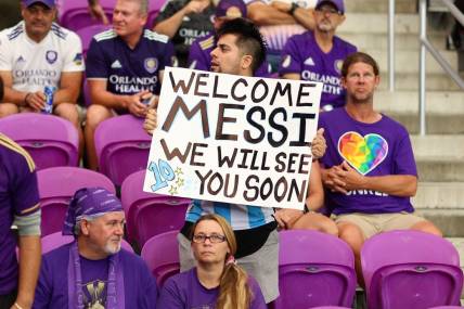 Jun 10, 2023; Orlando, Florida, USA;  fans show support for Lionel Messi before a match featuring Orlando City SC and the Colorado Rapids at Exploria Stadium. Mandatory Credit: Nathan Ray Seebeck-USA TODAY Sports