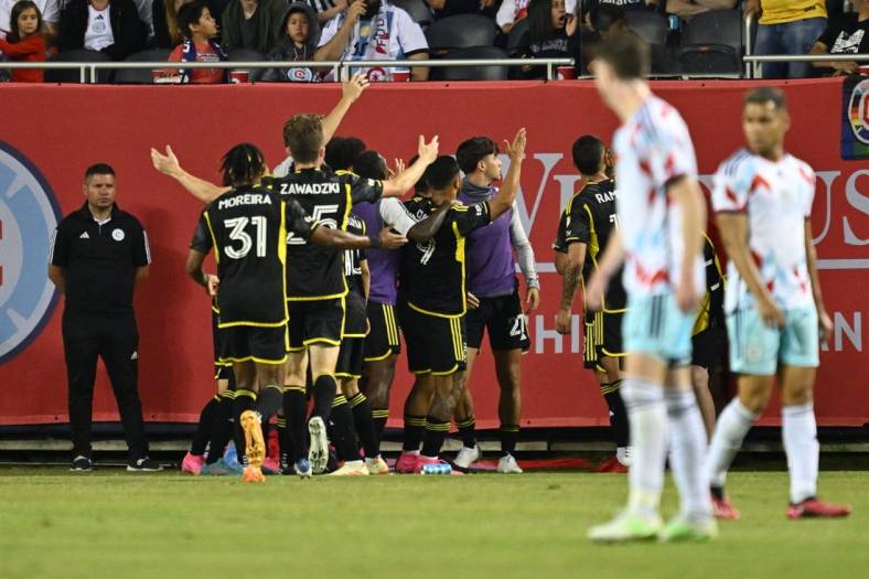 Jun 10, 2023; Chicago, Illinois, USA; Columbus Crew SC forward Cucho Hernandez (9) celebrates his goal with teammates against Chicago Fire during the second half at Soldier Field. Mandatory Credit: Jamie Sabau-USA TODAY Sports