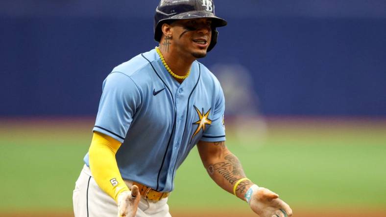 Jun 11, 2023; St. Petersburg, Florida, USA;  Tampa Bay Rays shortstop Wander Franco (5) celebrates after hitting a three run home run against the Texas Rangers in the fourth inning at Tropicana Field. Mandatory Credit: Nathan Ray Seebeck-USA TODAY Sports