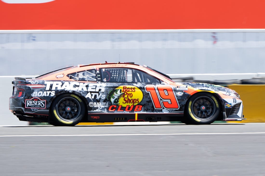 Jun 11, 2023; Sonoma, California, USA; NASCAR Cup Series driver Martin Truex Jr. (19) races at Sonoma Raceway. Mandatory Credit: Stan Szeto-USA TODAY Sports