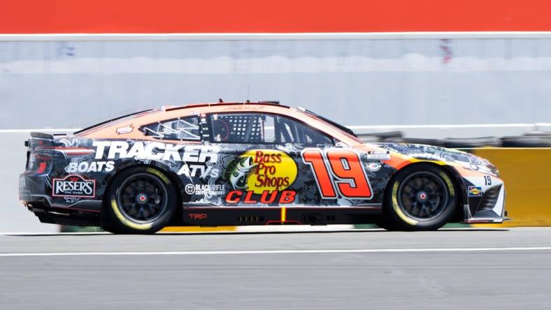 Jun 11, 2023; Sonoma, California, USA; NASCAR Cup Series driver Martin Truex Jr. (19) races at Sonoma Raceway. Mandatory Credit: Stan Szeto-USA TODAY Sports