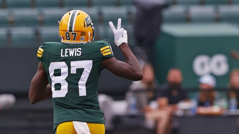 Jun 11, 2023; Edmonton, Alberta, CAN; Edmonton Elks wide receiver Eugene Lewis (87) celebrates a touchdown against the Saskatchewan Roughriders during the first half at Commonwealth Stadium. Mandatory Credit: Perry Nelson-USA TODAY Sports