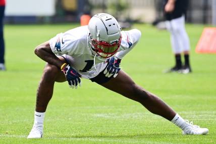 Jun 12, 2023; Foxborough, MA, USA; New England Patriots wide receiver DeVante Parker (1) stretching at the Patriots minicamp at Gillette Stadium.  Mandatory Credit: Eric Canha-USA TODAY Sports