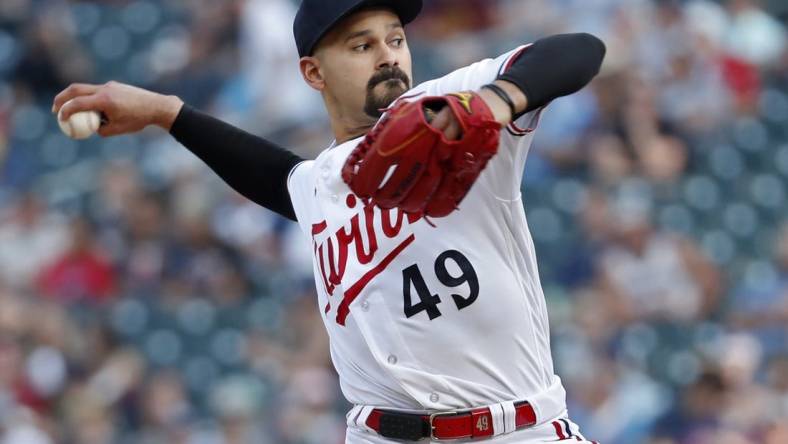 Jun 13, 2023; Minneapolis, Minnesota, USA; Minnesota Twins starting pitcher Pablo Lopez (49) throws to the Milwaukee Brewers in the first inning at Target Field. Mandatory Credit: Bruce Kluckhohn-USA TODAY Sports