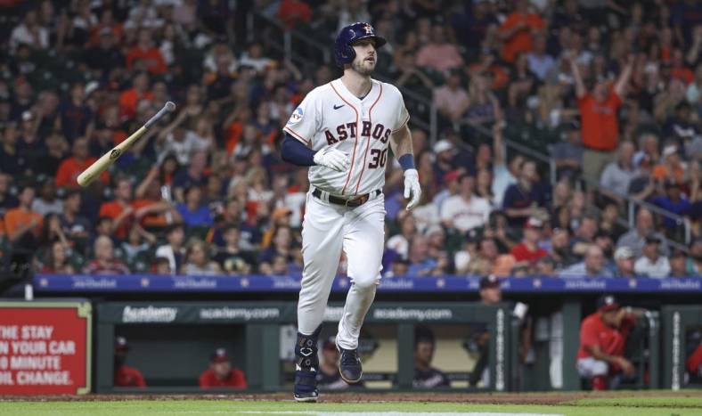 Jun 13, 2023; Houston, Texas, USA; Houston Astros right fielder Kyle Tucker (30) tosses his bat after hitting a home run during the fifth inning against the Washington Nationals at Minute Maid Park. Mandatory Credit: Troy Taormina-USA TODAY Sports
