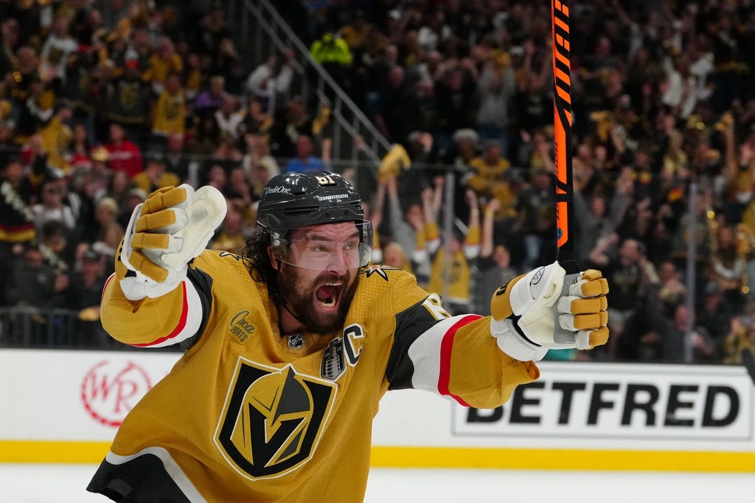 Jun 13, 2023; Las Vegas, Nevada, USA; Vegas Golden Knights forward Reilly Smith (19) celebrates his goal against the Florida Panthers during the second period in game five of the 2023 Stanley Cup Final at T-Mobile Arena. Mandatory Credit: Stephen R. Sylvanie-USA TODAY Sports