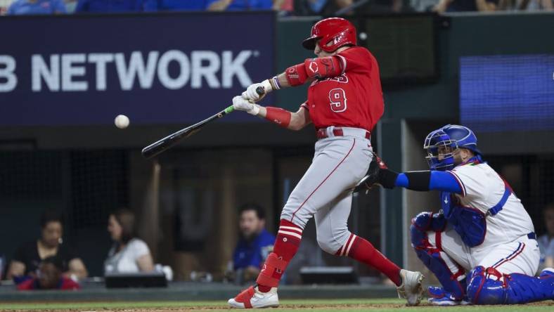 Jun 13, 2023; Arlington, Texas, USA;  Los Angeles Angels shortstop Zach Neto (9) hits a two-run home run during the ninth inning against the Texas Rangers at Globe Life Field. Mandatory Credit: Kevin Jairaj-USA TODAY Sports