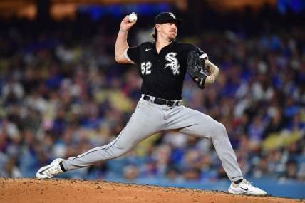 Jun 14, 2023; Los Angeles, California, USA; Chicago White Sox starting pitcher Mike Clevinger (52) throws against the Los Angeles Dodgers during the fourth inning at Dodger Stadium. Mandatory Credit: Gary A. Vasquez-USA TODAY Sports