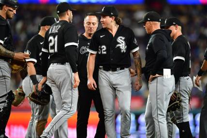 Jun 14, 2023; Los Angeles, California, USA; Chicago White Sox starting pitcher Mike Clevinger (52) reacts after suffering an apparent injury against the Los Angeles Dodgers/ during the fifth inning at Dodger Stadium. Mandatory Credit: Gary A. Vasquez-USA TODAY Sports