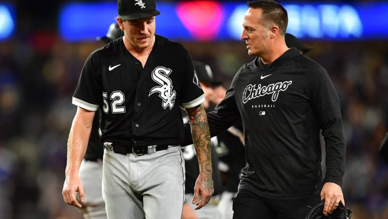 Jun 14, 2023; Los Angeles, California, USA; Chicago White Sox starting pitcher Mike Clevinger (52) goes to the dugout after suffering an apparent injury against the Los Angeles Dodgers/ during the fifth inning at Dodger Stadium. Mandatory Credit: Gary A. Vasquez-USA TODAY Sports