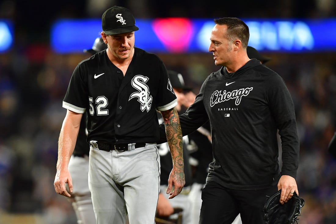 Jun 14, 2023; Los Angeles, California, USA; Chicago White Sox starting pitcher Mike Clevinger (52) goes to the dugout after suffering an apparent injury against the Los Angeles Dodgers/ during the fifth inning at Dodger Stadium. Mandatory Credit: Gary A. Vasquez-USA TODAY Sports