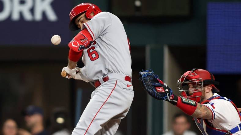 Jun 15, 2023; Arlington, Texas, USA; Los Angeles Angels third baseman Anthony Rendon (6) is hit by a pitch in the first inning against the Texas Rangers at Globe Life Field. Mandatory Credit: Tim Heitman-USA TODAY Sports