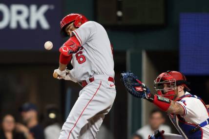 Jun 15, 2023; Arlington, Texas, USA; Los Angeles Angels third baseman Anthony Rendon (6) is hit by a pitch in the first inning against the Texas Rangers at Globe Life Field. Mandatory Credit: Tim Heitman-USA TODAY Sports