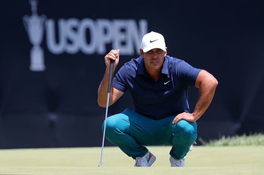 Jun 16, 2023; Los Angeles, California, USA; Brooks Koepka (LIV player) lines up a putt on the on the ninth green during the second round of the U.S. Open golf tournament. Mandatory Credit: Kiyoshi Mio-USA TODAY Sports