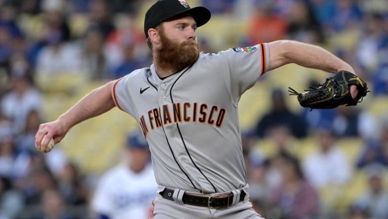 Jun 16, 2023; Los Angeles, California, USA; San Francisco Giants relief pitcher John Brebbia (59) pitches in the first inning against the Los Angeles Dodgers at Dodger Stadium. Mandatory Credit: Jayne Kamin-Oncea-USA TODAY Sports