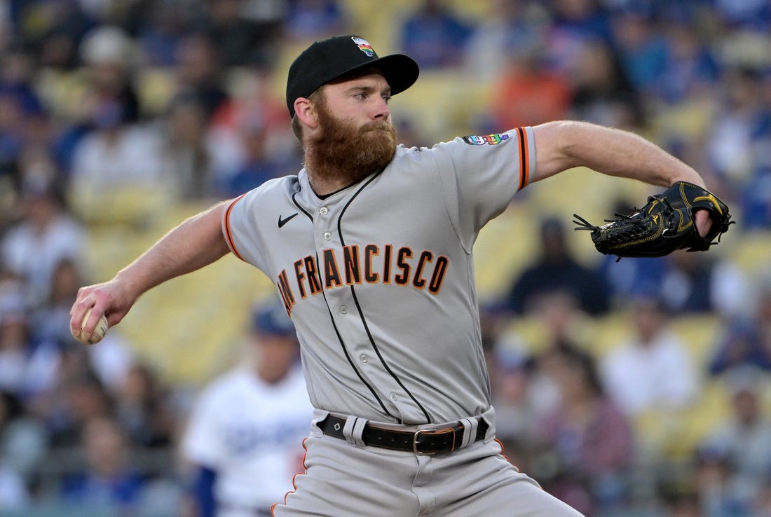Jun 16, 2023; Los Angeles, California, USA; San Francisco Giants relief pitcher John Brebbia (59) pitches in the first inning against the Los Angeles Dodgers at Dodger Stadium. Mandatory Credit: Jayne Kamin-Oncea-USA TODAY Sports