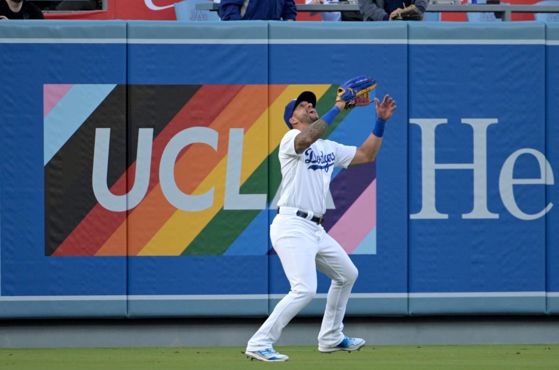 Jun 16, 2023; Los Angeles, California, USA;   Los Angeles Dodgers left fielder David Peralta (6) makes a catch for an out in the first inning against the San Francisco Giants at Dodger Stadium. Mandatory Credit: Jayne Kamin-Oncea-USA TODAY Sports