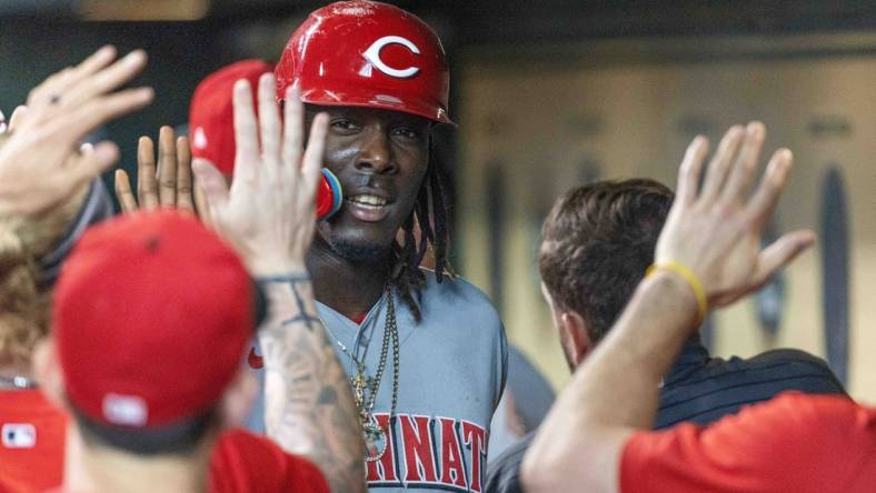 Jun 17, 2023; Houston, Texas, USA; Cincinnati Reds third baseman Elly De La Cruz (44) celebrates with teammates after scoring against the Houston Astros in the seventh inning at Minute Maid Park. Mandatory Credit: Thomas Shea-USA TODAY Sports