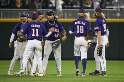 Jun 17, 2023; Omaha, NE, USA; The LSU Tigers celebrate the win against the Tennessee Volunteers at Charles Schwab Field Omaha. Mandatory Credit: Steven Branscombe-USA TODAY Sports