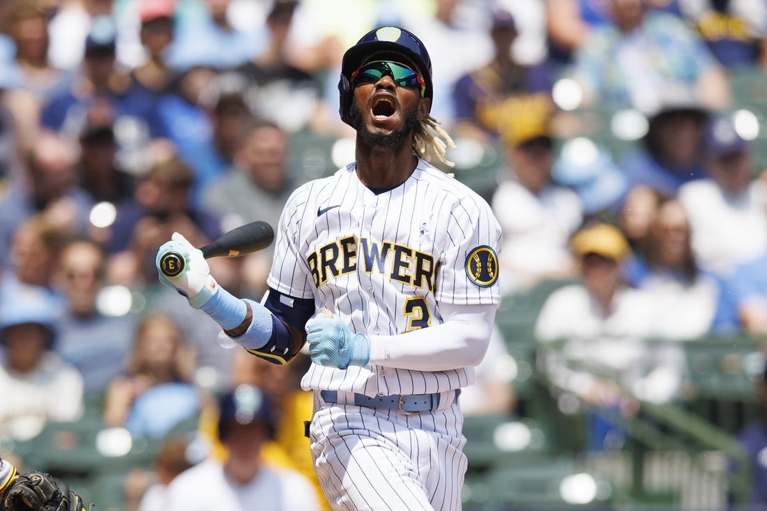 MILWAUKEE, WI - JUNE 26: Colorado Rockies left fielder Raimel Tapia (15)  slams his bat in frustration during a game between the Milwaukee Brewers  and the Colorado Rockies on June 26, 2021