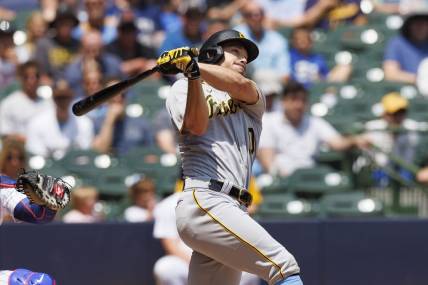 Jun 18, 2023; Milwaukee, Wisconsin, USA;  Pittsburgh Pirates designated hitter Bryan Reynolds (10) hits a home run during the third inning against the Milwaukee Brewers at American Family Field. Mandatory Credit: Jeff Hanisch-USA TODAY Sports