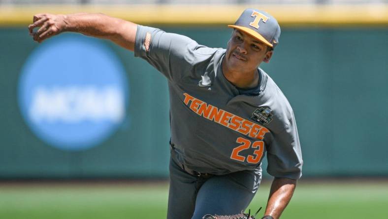 Jun 19, 2023; Omaha, NE, USA;  Tennessee Volunteers pitcher Chase Burns (23) throws against the Stanford Cardinal in the fourth inning at Charles Schwab Field Omaha. Mandatory Credit: Steven Branscombe-USA TODAY Sports